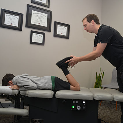 Boy lying down for treatment